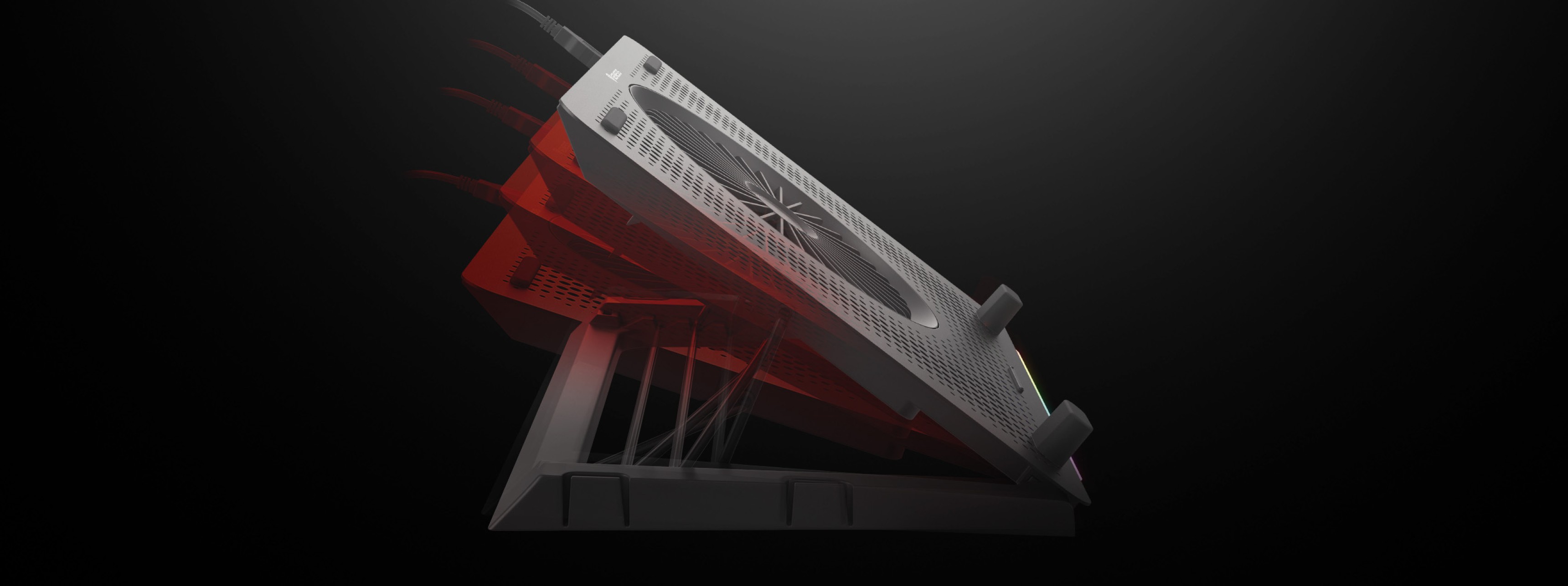 Almohadilla de refrigeración para portátil Genesis Oxid 450 RGB con ventilador, inclinación ajustable y dos puertos USB, mostrada sobre un fondo oscuro