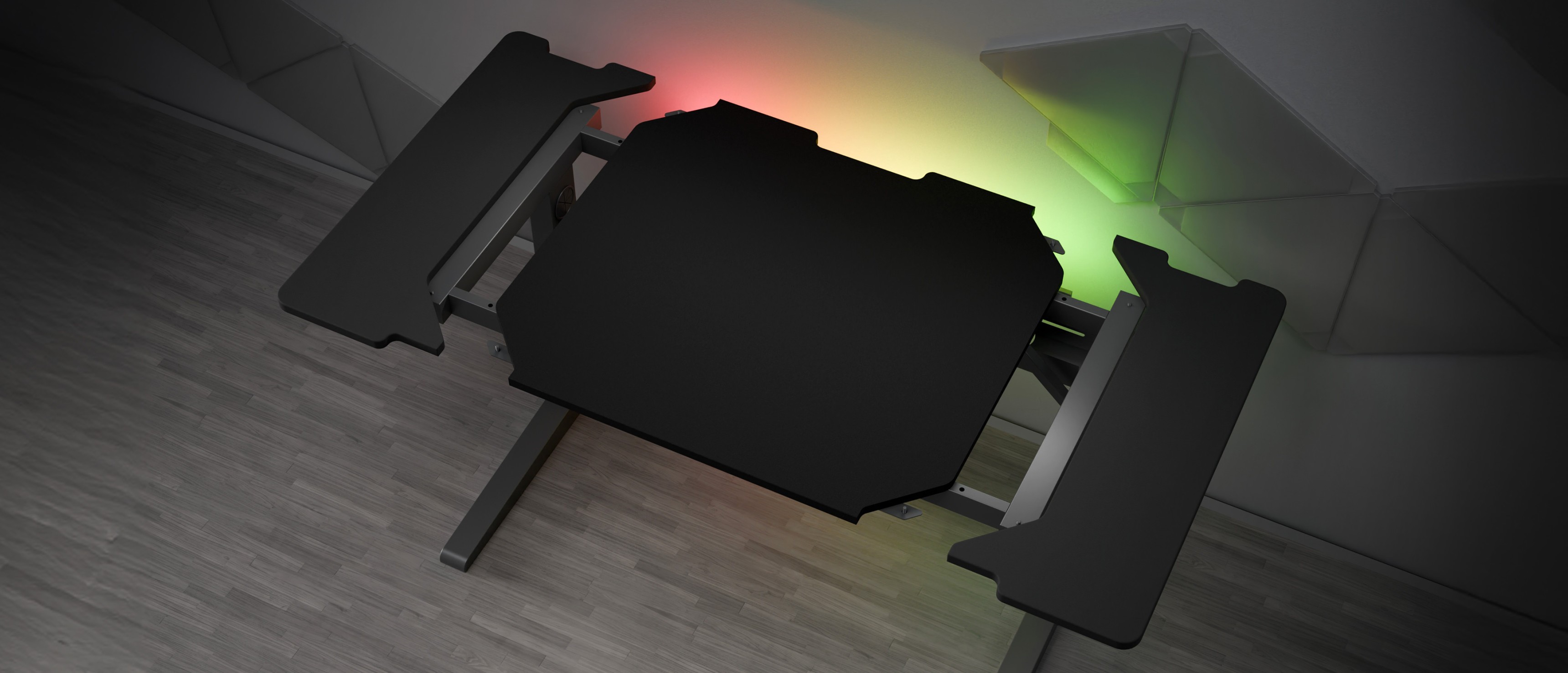 Escritorio modular para juegos con una elegante superficie negra e iluminación RGB personalizable en los bordes