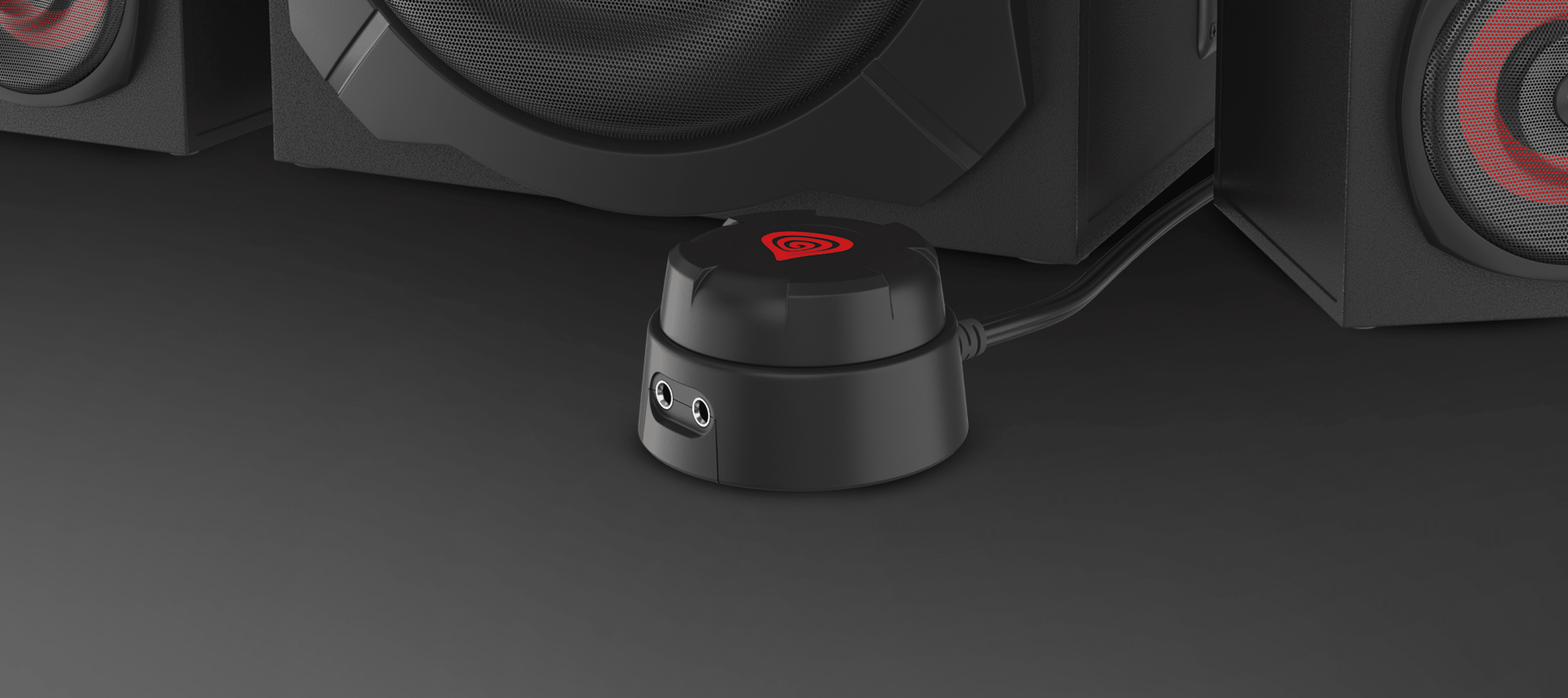Mando a distancia con cable negro para los altavoces Genesis Helium 610BT, con entradas de audio, situado cerca del subwoofer