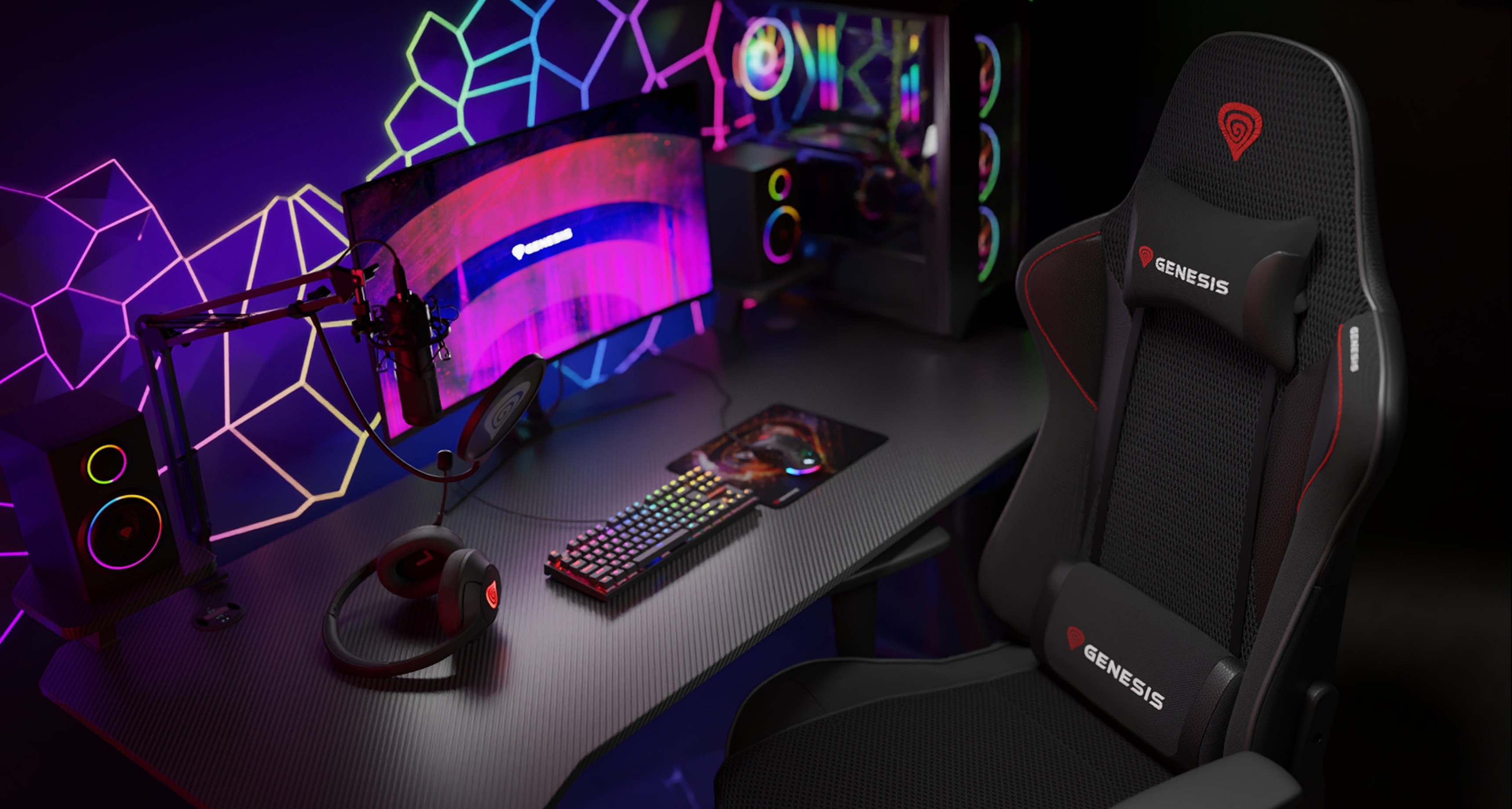 Silla de malla negra Genesis Nitro 440 G2 colocada junto a una elegante configuración de juego con un monitor vibrante y periféricos RGB